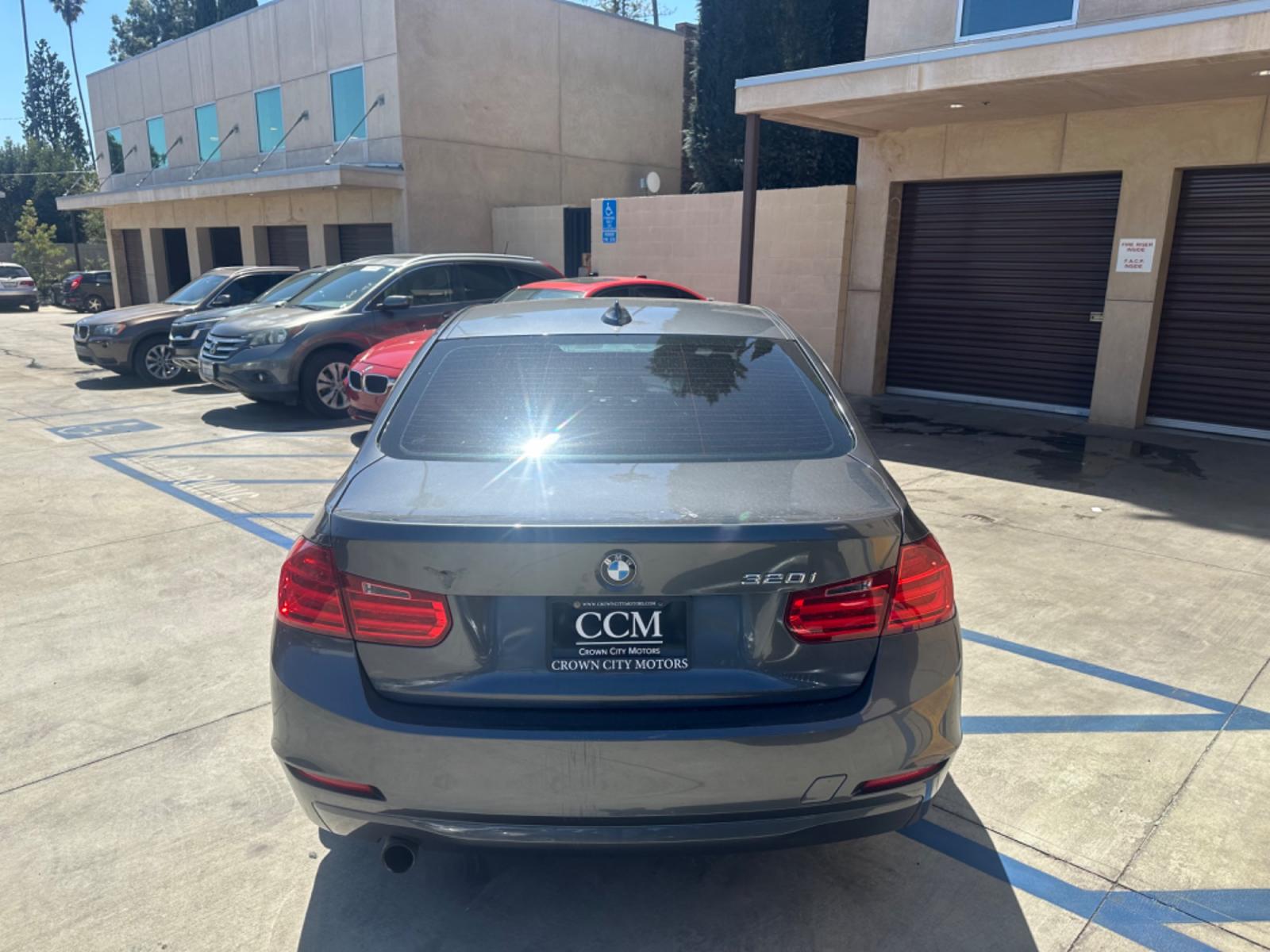 2014 Gray /Black BMW 3-Series leather (WBA3B1C52EK) with an 4 Cylinder engine, Automatic transmission, located at 30 S. Berkeley Avenue, Pasadena, CA, 91107, (626) 248-7567, 34.145447, -118.109398 - Moon-roof! Premium package! this 2014 BMW 3-Series 320i Sedan looks and drives well. Looking for a reliable and stylish vehicle in Pasadena, CA? Look no further! We have this sleek 2014 BMW 3-Series 320i Sedan available at our dealership. Whether you have perfect credit or are concerned about your c - Photo #4